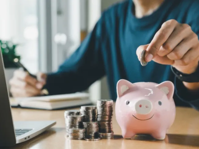 saving money in piggy bank